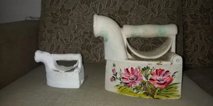 Ferro de passa roupa amtigo