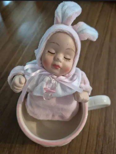 Boneca porcelana música 
