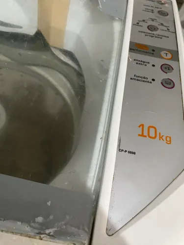 Máquina de lavar com defeito