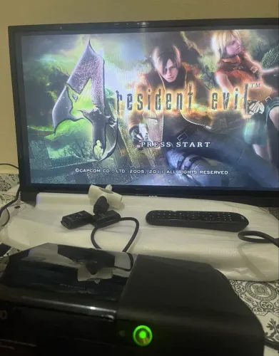 Xbox 360 + 2 jogos gta V e battlefied 3