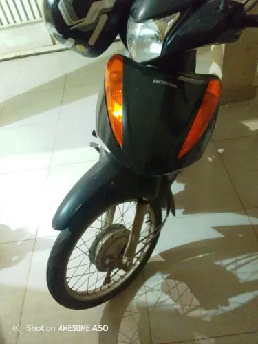 Vendo moto Honda biz.