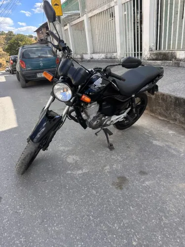 Titan 150 completa bem cuidada