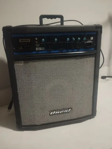 Caixa Amplificada Oneal OCM 350 muito conservada e com capa de proteção.