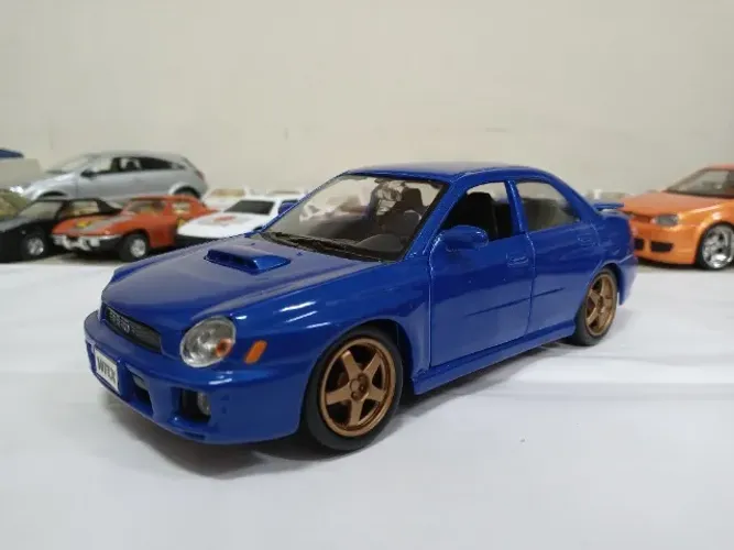 Miniatura Subaru Impreza WRX 1/24 Maisto Thailand #LE309