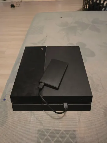 PS4 Fat + jogos físicos