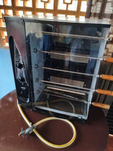 Churrasqueira a gás Arke 5 espetos Muito Nova Desapego