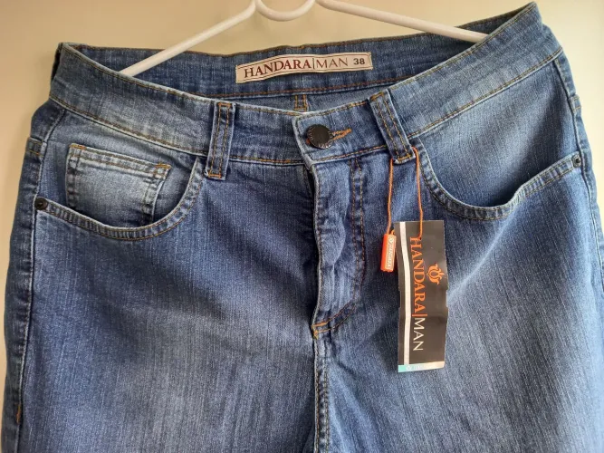 Calça slim nova