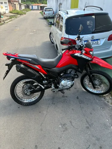 Bros toda revisada na Honda peças todas originais.