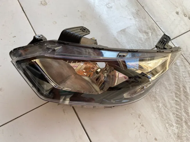 Vendo farol lado esquerdo Onix original 