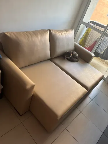 Sofá de couro sintético em bom estado