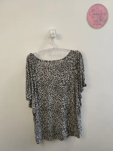 Blusa animal print preto e branco GG