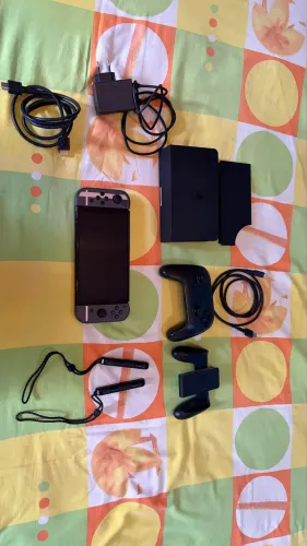 Nintendo Switch OLED + Acessórios+ controle Pro