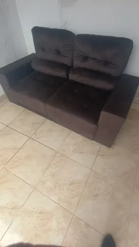 Sofá retrátil novo.