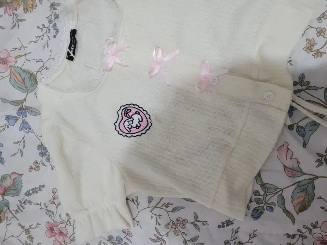 Blusa Coelho laços