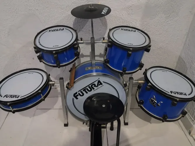 Bateria infantil usada 