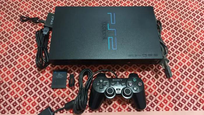 Playstation 2 fat sem leitor com 20 jogos nele