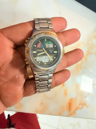 Relógio Citizen Promaster C120 série ouro