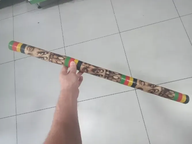 Pau de chuva instrumento percussão 