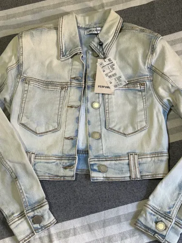 Jaqueta lança perfume TAM PP veste P