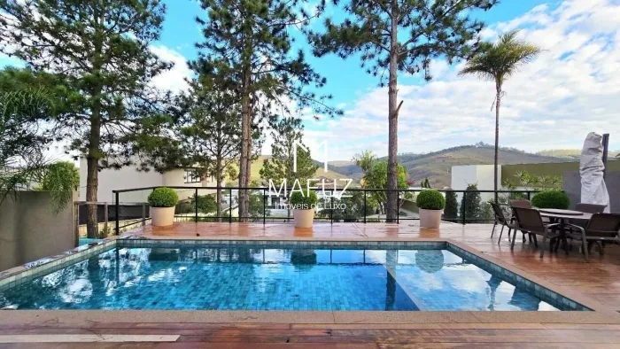 CASA DE 4 QUARTOS, PISCINA AQUECIDA E VISTA PARA NATUREZA EM TERRENO DE 1.410