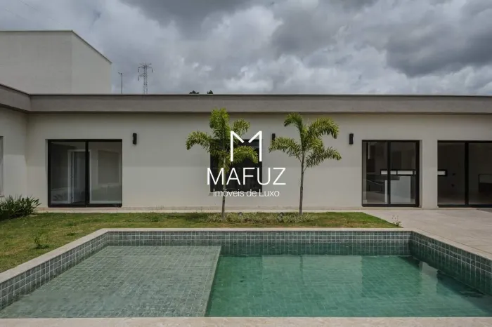CASA COM 4 SUITES E AREA DE LAZER COMPLETA - DISPONIVEL PRA VENDA