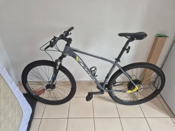 BICICLETA Aro29 OGGI BIG WHEEL 7.1 CUES 10V 2024 T-19 GRAFITE/AMARELO/CINZA