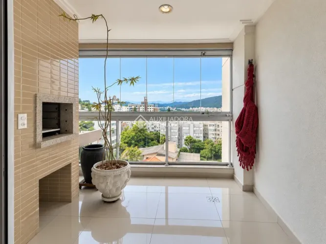 Apartamento de 3 dormitórios 88m2 privativos 1 vaga de garagem no bairro Trindade