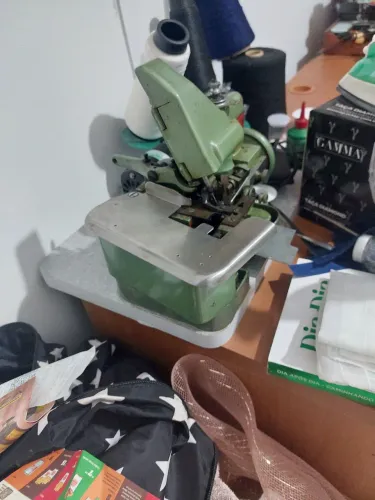 Maquina overlok portati