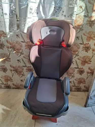 Cadeirinha de transporte  para criancas 