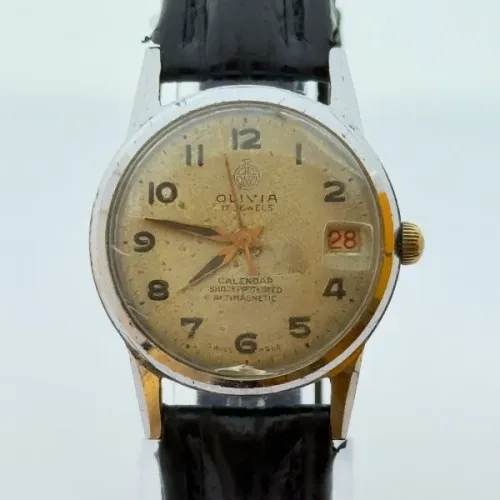 Relógio Suíço Vintage Olivia Calendar - 17 Jewels - Anos 60