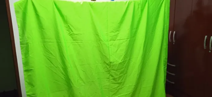 Suporte fundo infinito e tecido verde