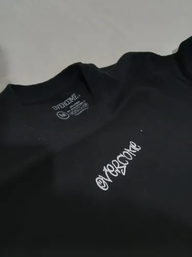 camisa overcome