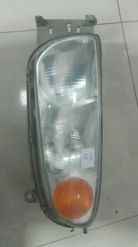 FAROL DIANTEIRO ESQUERDO FORD FIESTA (96 A 99).