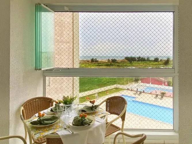 Apartamento no Mar Grosso, Laguna-SC, 2 quartos (1 suíte) e vista para o mar