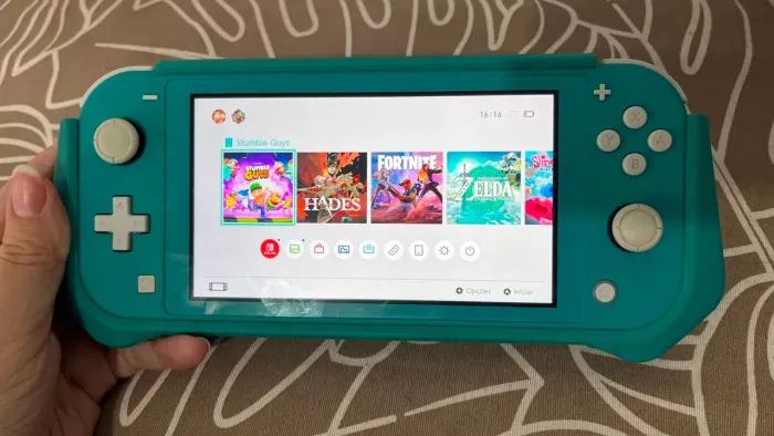Nintendo Switch lite turquesa com diversos jogos - INTACTO
