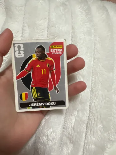 Figurinha prata da copa 2026 do JEREMY DOKU EXTRA STICKERS