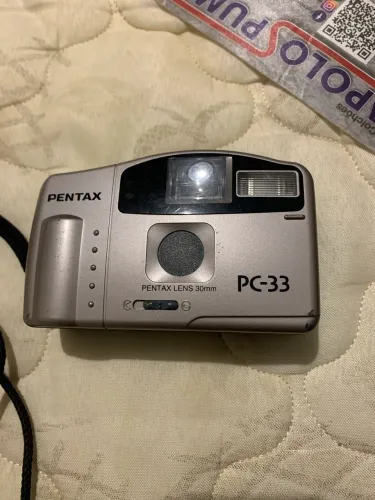 Câmera fotográfica 35mm Pentax PC-33 foto filme