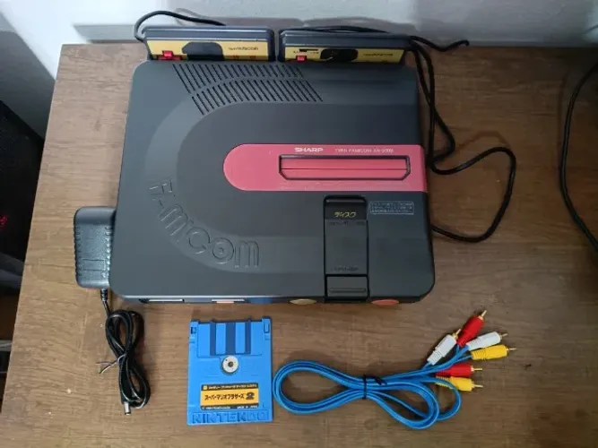 Console Sharp Twin Famicom Revisado, correia nova, lendo discos perfeitamente.