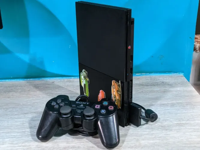 PS2 Slim Completo Com um Controle Original e Com Nove Jogo inclusos