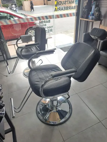 Cadeira de barbeiro reclinável