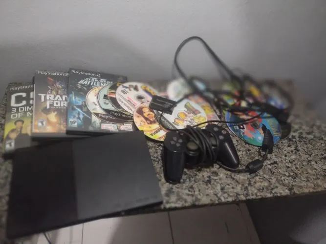 Ps2 (SCPH-90010 última geração) incluí controle jogos e dvd