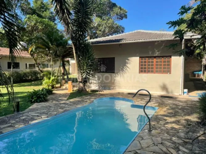 Casa Para Venda 3 Dormitórios uma suite piscina Condomínio Palmeiras