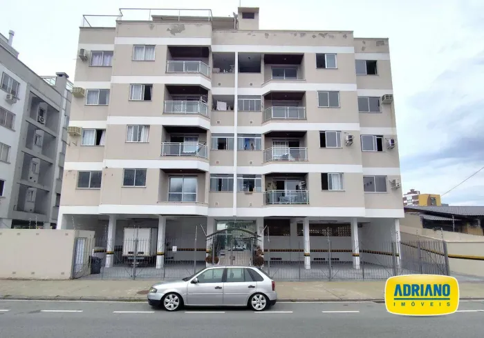 Apartamento com 2 dormitórios para alugar, 59 m² por R$ 3.312,06/mês - Capoeiras - Florian