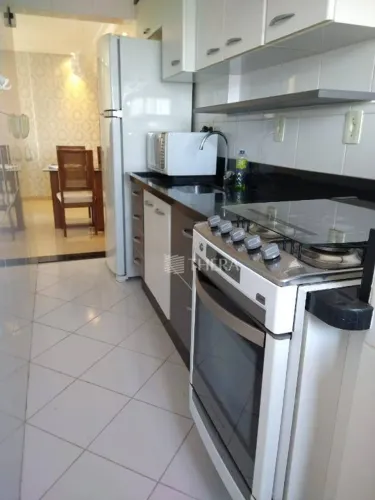 Apartamento com 2 dormitórios para alugar, 57 m² por R$ 3.062,56/mês - Vila Alpina - Santo