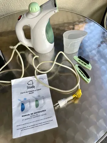Ferro de viagem a vapor portátil - Studii