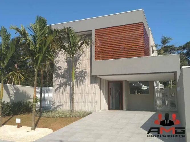 Casa com 5 dormitórios à venda, 335 m² por R$ 7.000.000,00 - Riviera - Módulo 24 - Bertiog