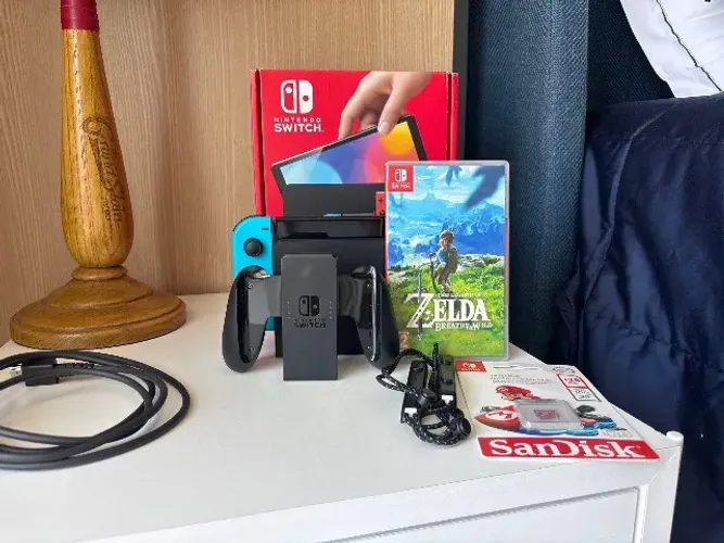 Nintendo switch azul e vermelho + Joy con neon + Zelda breath of the wild + Micro SDXC128