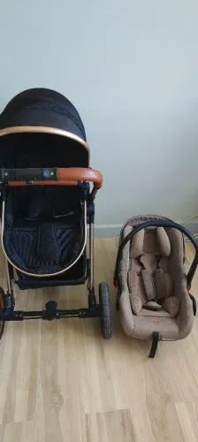 Carrinho é bebê conforto passear 