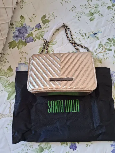 Bolsa Santa Lolla dourada, nova