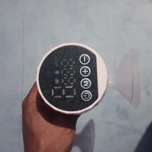 Bomba tira leite elétrica rosa - pouco usada